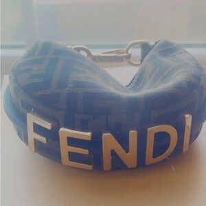 Never worn NEW with the box . Authentic Fendi Wristlet .